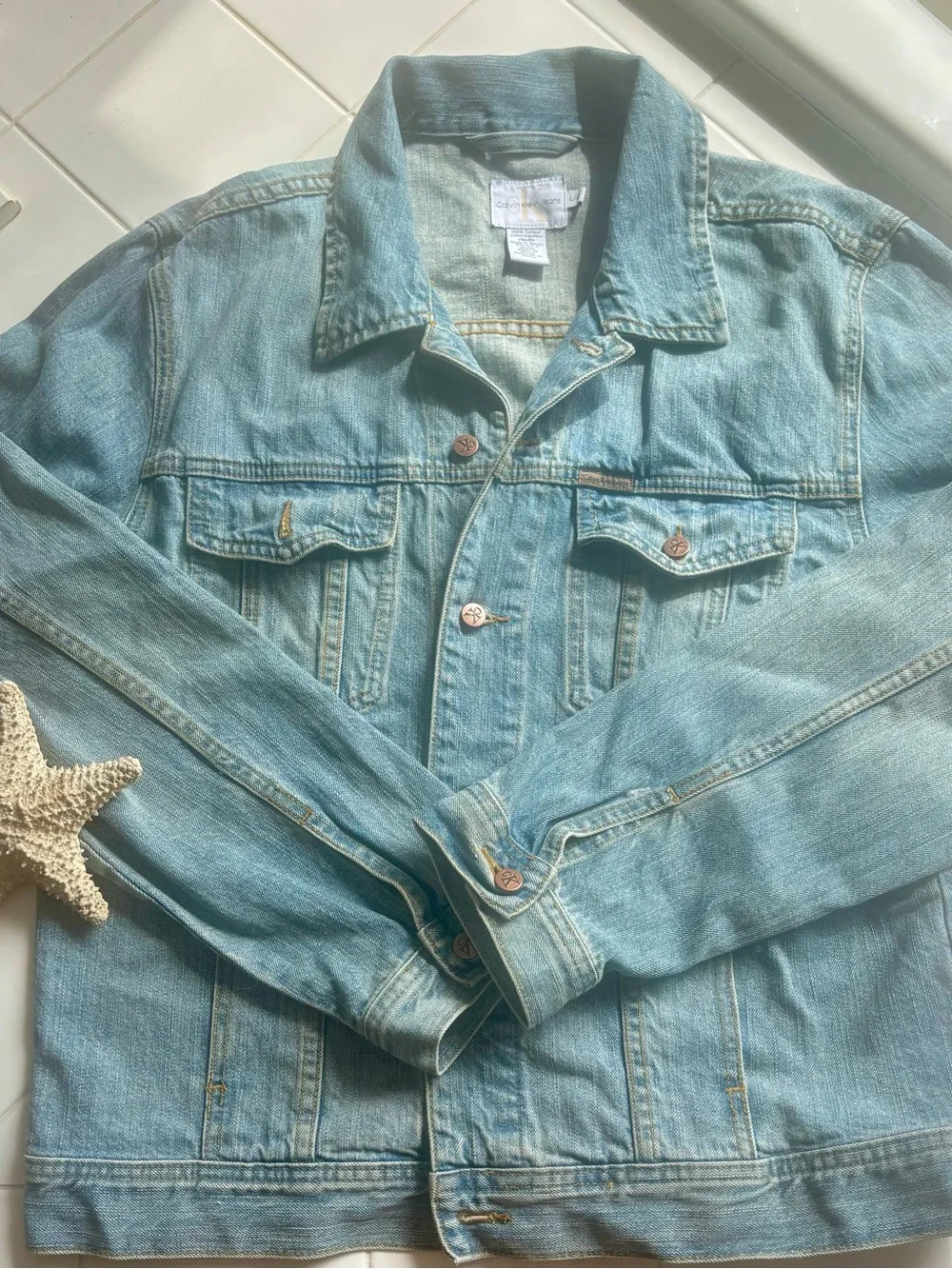Calvin Klein Light Blue Denim Jacket with Subtle Gold Logo